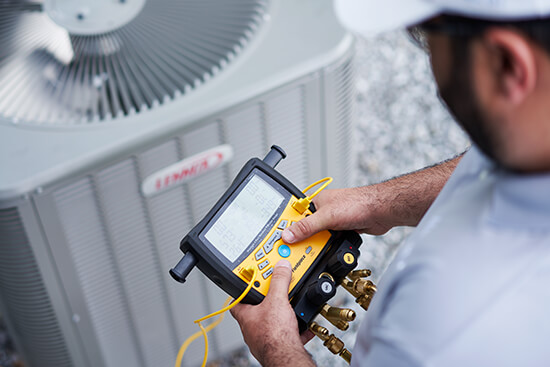 HVAC Technician Performing Heating and Cooling Maintenance in Charlotte, NC